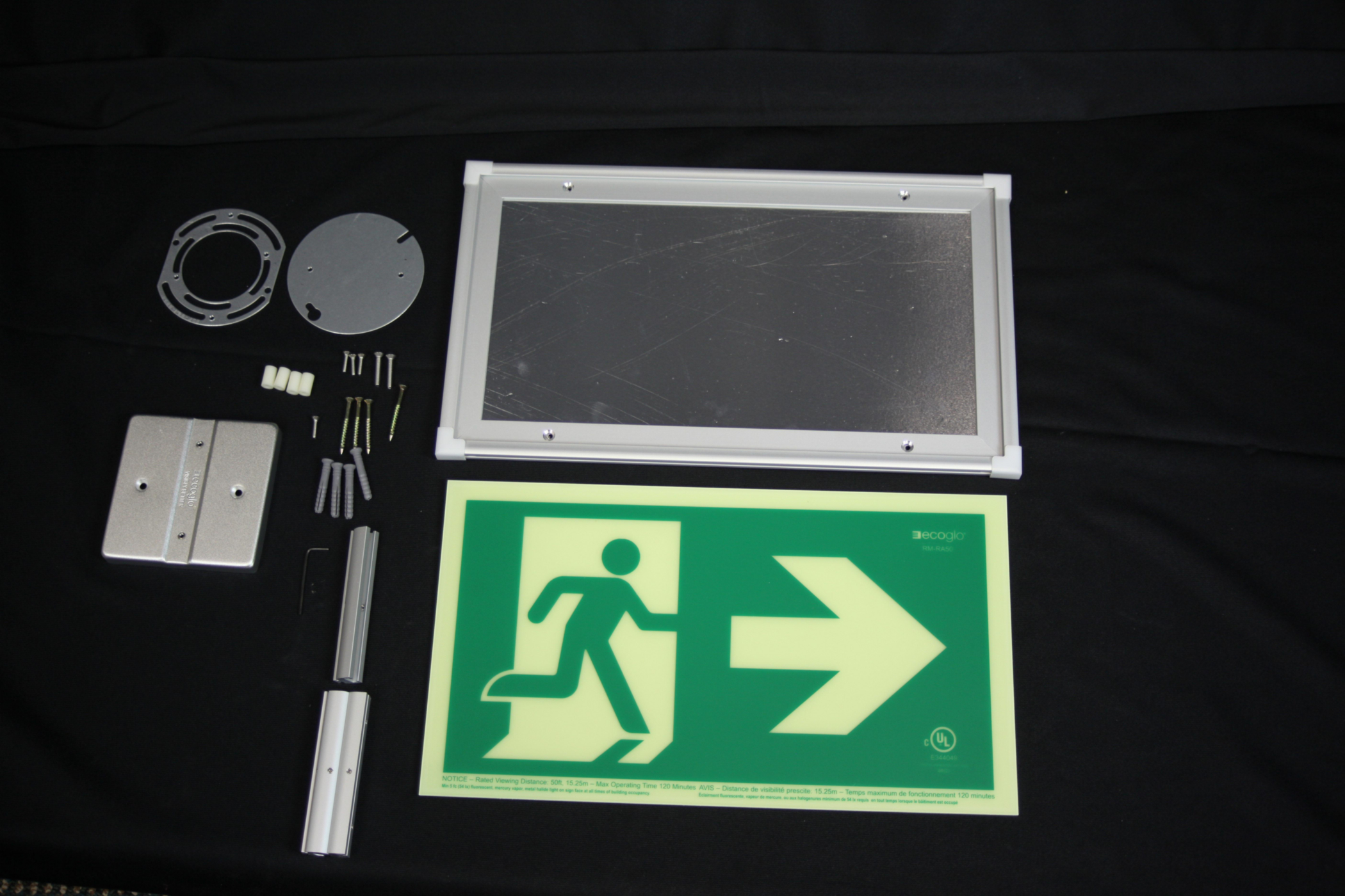 Product image for ECOGLO RM-RA50-CA EXIT SIGN PHOTOLUMINESCENT SINGLE SIDED UNIVERSAL MOUNT RUNNING MAN WITH ARROW RIGHT