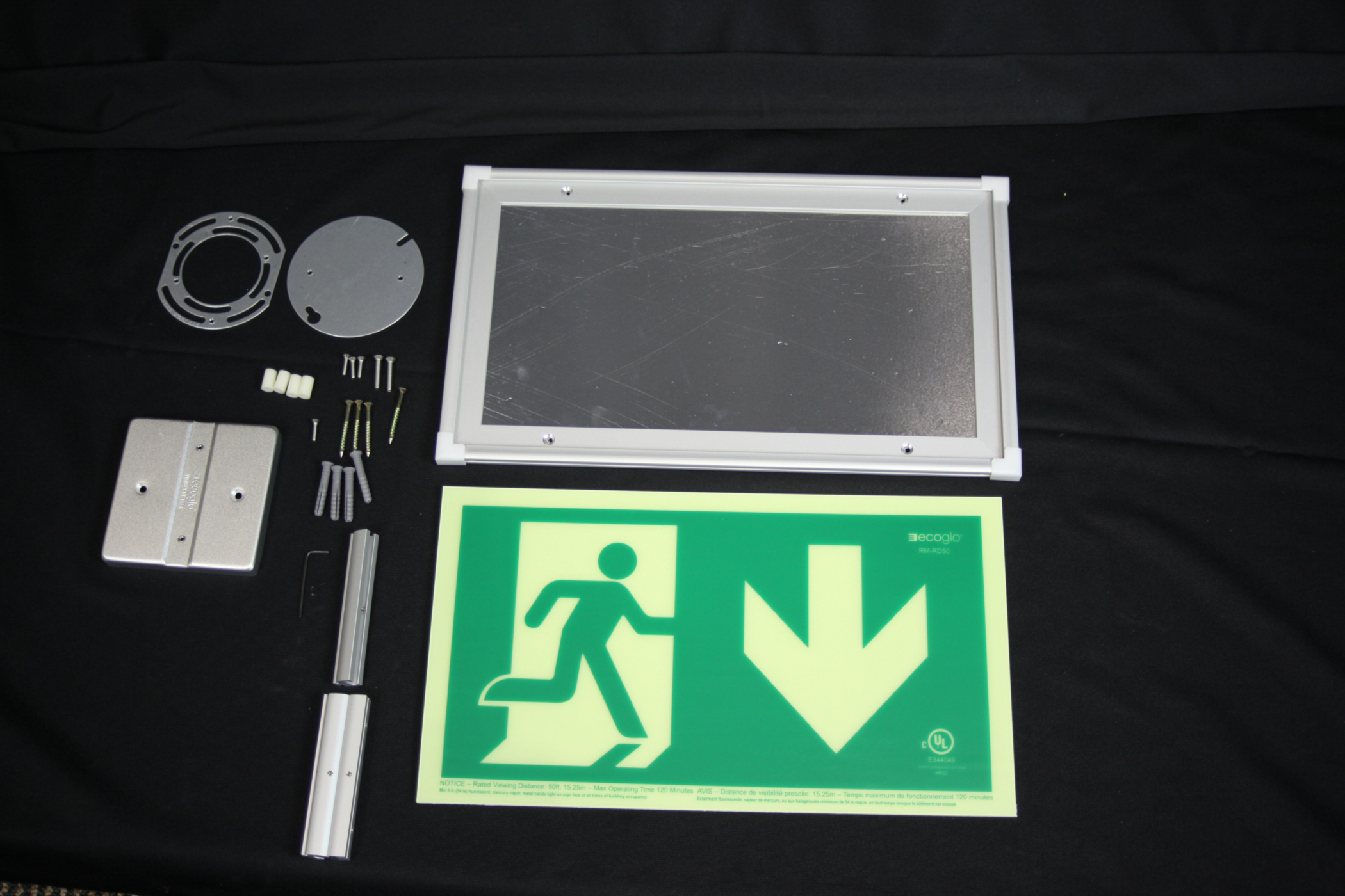 Product image for ECOGLO RM-RD50-CA EXIT SIGN PHOTOLUMINESCENT SINGLE SIDED RIGHT FACING RUNNING MAN ARROW RIGHT 16.2X9.5" CLEAR ANODIZED ALUMINUM FRAME MOUNTING KIT